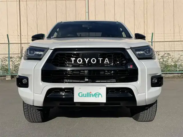 トヨタ ハイラックス Z GRスポーツ 東京都 2024(令6)年 1.1万km プラチナホワイトパールマイカ ワンオーナー　/純正８型ディスプレィオーディオナビ /・BluetoothAudio/USB/AM/FM/アラウンドビューモニター /GRドレスUPマフラー /ハーフレザーシート/・D席シートヒーター/GRサイドステップ /バイカラーLEDフォグランプ /プリクラッシュセーフティ /レーダークルーズコントロ-ル/レーンディパーチャーアラート/ロードサインアシスト/クリアランスソナー/バックソナー/アクティブトラクションコントロール/ダウンヒルアシストコントロール/リアデフロック/プッシュエンジンスタート/保証書＆取説