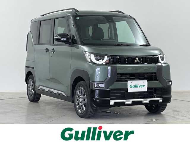 三菱 デリカミニ T プレミアム 道央・札幌 2024(令6)年 0.1千km 緑 ・届出済未使用車/・４WD/寒冷地仕様/・9型ディスプレイオーディオ/・BT/USB/APPLEカープレイ/アンドロイドオート/・アラウンドビューモニター/・e-assist/・マイパイロット/・デジタルインナーミラー/・クリアランスソナー/・レーンキープアシスト/・アダプティブクルーズコントロール/・ダウンヒルアシストコントロール/・横滑り防止装置/・両側パワースライドドア/・パドルシフト/・D＋N席シートヒーター/・ステアリングスイッチ/・ステアリングヒーター/・LEDヘッドライト/・オートライト/・オートマチックハイビーム/・プッシュスタート/・スマートキー/・スペアキー/・純正15インチＡＷ/・保証書/・取扱説明書