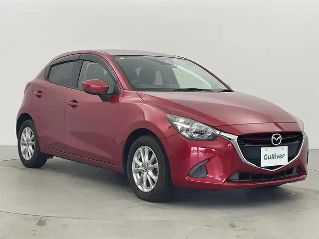 マツダ デミオ XD 富山県 2014(平26)年 6.3万km ソウルレッドプレミアムメタリック 純正ナビ（AM/FM/BT/USB）/バックカメラ/ドライブレコーダー/ETC/衝突被害軽減システム/横滑り防止装置/アイドリングストップ/純正アルミホイール/純正フロアマット/ハロゲンライト/ステアリングスイッチ/電動格納ミラー/スマートキー/スペアキー