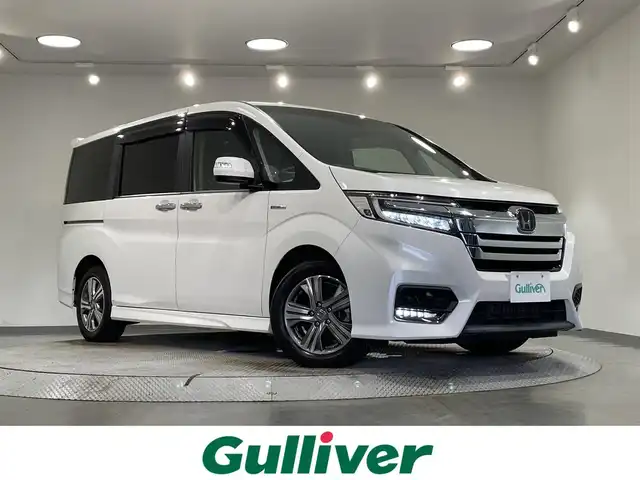 ホンダ ステップワゴン スパーダ ハイブリッド G EX ホンダセンシング 愛知県 2018(平30)年 3.8万km プラチナホワイトパール 純正１０インチナビ/両側パワースライドドア/衝突軽減ブレーキ/レーダークルーズコントロール/レーンキープアシスト/先行車発進告知/わくわくゲート/バックカメラ/ドライブレコーダー/ビルトインＥＴＣ/ハーフレザー/シートヒーター/ＬＥＤヘッドライト/USB入力端子/ISOFIX/純正フロアマット/純正16インチアルミホイール