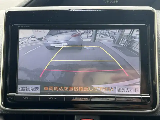 トヨタ ヴォクシー ZS 兵庫県 2014(平26)年 10.8万km ボルドーマイカメタリック 純正ナビ(AM/FM/CD/DVD/TV/BT)/バックカメラ/アイドリングストップ/革巻きステアリング/ステアリングリモコン/プッシュスタート/ビルドインETC/前方ドライブレコーダー/両側パワースライドドア/三列シート/純正フロアマット/ドアバイザー/LEDヘッドライト/純正19インチアルミホイール/スマートキー/保証書/取扱説明書
