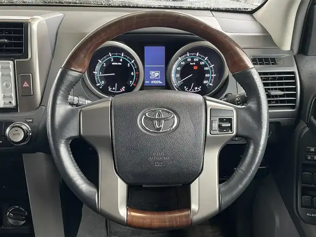 トヨタ ランドクルーザー プラド TX 福岡県 2011(平23)年 4.9万km ブラック ワンオーナー/純正ディーラーナビ（NSDN-W60）/ワンセグTV/CD/DVD/バックカメラ/ビルトインETC/ステップ/ドアバイザー/純正アルミホイール/純正フロアマット/プッシュスタート/2列シート/5名乗り/パワーウィンドウ/ブラウンウッド付ハンドル/スペアタイヤ/取扱説明書/スペアキー/スマートキー