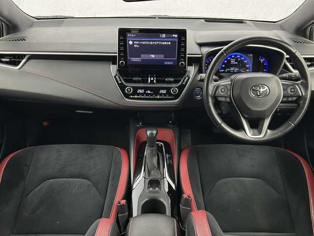 トヨタ カローラ スポーツ ハイブリッドG Z 宮城県 2020(令2)年 6万km アティチュードブラックマイカ/ホワイトパールクリスタルシャイン 禁煙車/モデリスタエアロ（F.S.R）/トヨタセーフティーセンス/・プリクラッシュセーフティーシステム/・レーダークルーズコントロール/・レーントレーシングアシスト/・オートマチックハイビーム/・パーキングサポートブレーキ/・ロードサインアシスト/・ソナー/ヘッドアップディスプレイ/前席シートヒーター/赤革スエードコンビシート/純正9インチディスプレイオーディオ/・BT.AM.FM.USB.Miracast/バックカメラ/フルセグテレビ/電動パーキングブレーキ/AUTOHOLD/ビルトインETC/プッシュスタート/スマートキー/革巻きステアリング/ステアリングスイッチ/純正フロアマット/純正ドアバイザー/純正18インチアルミホイール/LEDヘッドライト/LEDフォグランプ/横滑り防止機能/アイドリングストップ/ヘッドライトレベライザー