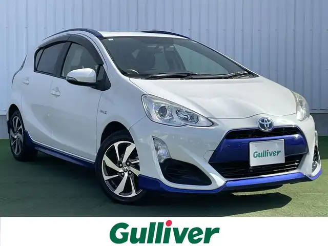 トヨタ アクア X－URBAN 香川県 2015(平27)年 7.6万km ライムホワイトパールクリスタルシャイン 純正7型ＳＤナビ（NSZT-W64）/・フルセグTV/・Bluetooth/・CD/バックカメラ/純正１６インチアルミホイール/ビルトインETC/純正ＬＥＤヘッドライト/スマートキー/プッシュスタート/ステアリングスイッチ/ハーフレザー/純正フロアマット/純正ドアバイザー/前ドライブレコーダー/２トーンカラー/Wエアバッグ