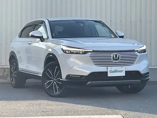 ホンダ ヴェゼル ハイブリッド e:HEV Z 山形県 2022(令4)年 3.7万km プラチナホワイトパール ホンダセンシング/純正メモリナビ/　　【BT　フルセグ　USB】/全周囲カメラ/電動リアゲート/レーダークルーズコントロール/LEDオートライト/ハーフレザーシート/シートヒーター/純正18インチアルミホイール/ブラインドスポットモニター/ダウンヒルアシストコントロール/ステアリングヒーター/ステアリングスイッチ/パドルシフト/ドライブレコーダー/スマートキー×2/ETC2.0