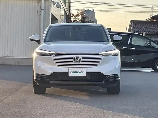 ホンダ ヴェゼル ハイブリッド e:HEV Z 山形県 2022(令4)年 3.7万km プラチナホワイトパール ホンダセンシング/純正メモリナビ/　　【BT　フルセグ　USB】/全周囲カメラ/電動リアゲート/レーダークルーズコントロール/LEDオートライト/ハーフレザーシート/シートヒーター/純正18インチアルミホイール/ブラインドスポットモニター/ダウンヒルアシストコントロール/ステアリングヒーター/ステアリングスイッチ/パドルシフト/ドライブレコーダー/スマートキー×2/ETC2.0