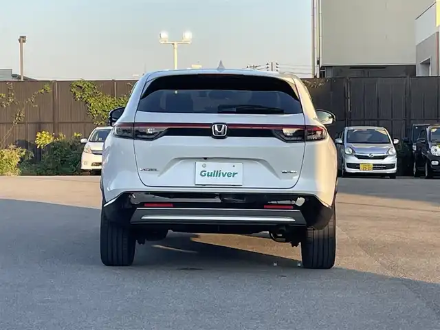 ホンダ ヴェゼル ハイブリッド e:HEV Z 山形県 2022(令4)年 3.7万km プラチナホワイトパール ホンダセンシング/純正メモリナビ/　　【BT　フルセグ　USB】/全周囲カメラ/電動リアゲート/レーダークルーズコントロール/LEDオートライト/ハーフレザーシート/シートヒーター/純正18インチアルミホイール/ブラインドスポットモニター/ダウンヒルアシストコントロール/ステアリングヒーター/ステアリングスイッチ/パドルシフト/ドライブレコーダー/スマートキー×2/ETC2.0