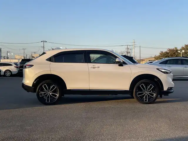 ホンダ ヴェゼル ハイブリッド e:HEV Z 山形県 2022(令4)年 3.7万km プラチナホワイトパール ホンダセンシング/純正メモリナビ/　　【BT　フルセグ　USB】/全周囲カメラ/電動リアゲート/レーダークルーズコントロール/LEDオートライト/ハーフレザーシート/シートヒーター/純正18インチアルミホイール/ブラインドスポットモニター/ダウンヒルアシストコントロール/ステアリングヒーター/ステアリングスイッチ/パドルシフト/ドライブレコーダー/スマートキー×2/ETC2.0