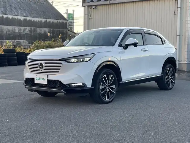 ホンダ ヴェゼル ハイブリッド e:HEV Z 山形県 2022(令4)年 3.7万km プラチナホワイトパール ホンダセンシング/純正メモリナビ/　　【BT　フルセグ　USB】/全周囲カメラ/電動リアゲート/レーダークルーズコントロール/LEDオートライト/ハーフレザーシート/シートヒーター/純正18インチアルミホイール/ブラインドスポットモニター/ダウンヒルアシストコントロール/ステアリングヒーター/ステアリングスイッチ/パドルシフト/ドライブレコーダー/スマートキー×2/ETC2.0