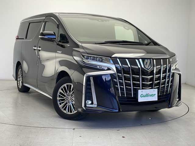 トヨタ アルファードハイブリット エグゼクティブ ラウンジ S 千葉県 2020(令2)年 3.1万km スパークリングブラックパールクリスタルシャイン 純正10インチナビ/　CD/DVD/Bluetooth/フルセグTV/　Apple car play/Android Auto/純正フリップダウンモニター/JBLサウンド/トヨタセーフティセンス/レーダークルーズコントロール/レーンキープアシスト/衝突軽減ブレーキ/クリアランスソナー/全方位カメラ/ブラインドスポットモニター/パーキングアシスト/先行車発進警報/ロードサインアシスト/電動パーキング/オートホールド/オートハイビーム/レザーシート/パワーシート/シートヒーター/エアーシート（セカンドシートまで）/メモリーシート（運転席）/ステアリングヒーター/デジタルインナーミラー/ワイヤレス充電/AC100V充電/ビルトインETC２．０/前後ドラレコ/ナノイー/後席テーブル/ロールサンシェード/三眼ヘッドライト/フォグランプ/フロアマット/ドアバイザー