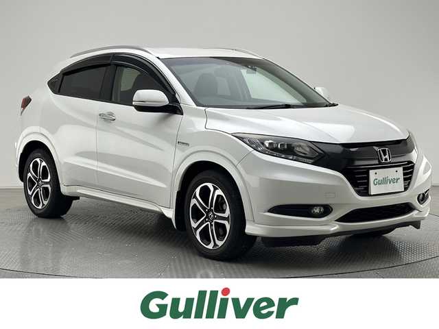 ホンダ ヴェゼル ハイブリッド Z 兵庫県 2015(平27)年 5万km ホワイトオーキッドパール 純正８型ナビ（ＢＴ，フルセグＴＶ）　/バックカメラ　/ＥＴＣ　/前後ドラレコ　/クルーズコントロール　/シティブレーキアクティブシステム/パドルシフト　/ハーフレザー　/シートヒーター　/純正１７インチアルミホイール