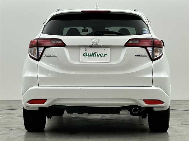 ホンダ ヴェゼル ハイブリッド Z 兵庫県 2015(平27)年 5万km ホワイトオーキッドパール 純正８型ナビ（ＢＴ，フルセグＴＶ）　/バックカメラ　/ＥＴＣ　/前後ドラレコ　/クルーズコントロール　/シティブレーキアクティブシステム/パドルシフト　/ハーフレザー　/シートヒーター　/純正１７インチアルミホイール