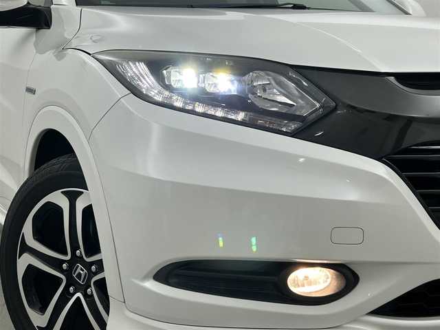 ホンダ ヴェゼル ハイブリッド Z 兵庫県 2015(平27)年 5万km ホワイトオーキッドパール 純正８型ナビ（ＢＴ，フルセグＴＶ）　/バックカメラ　/ＥＴＣ　/前後ドラレコ　/クルーズコントロール　/シティブレーキアクティブシステム/パドルシフト　/ハーフレザー　/シートヒーター　/純正１７インチアルミホイール