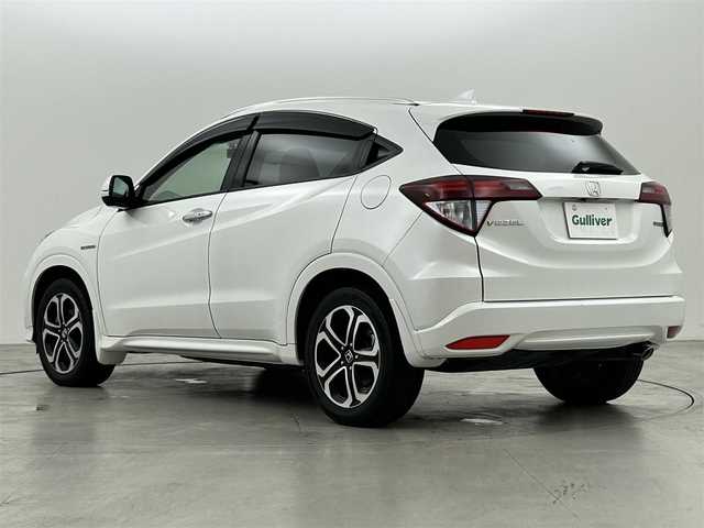 ホンダ ヴェゼル ハイブリッド Z 兵庫県 2015(平27)年 5万km ホワイトオーキッドパール 純正８型ナビ（ＢＴ，フルセグＴＶ）　/バックカメラ　/ＥＴＣ　/前後ドラレコ　/クルーズコントロール　/シティブレーキアクティブシステム/パドルシフト　/ハーフレザー　/シートヒーター　/純正１７インチアルミホイール