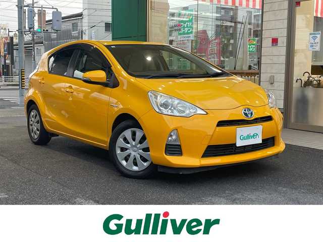 トヨタ アクア S 愛知県 2012(平24)年 4.8万km イエロー 純正メモリナビ〈NSCP-W62〉/・CD／Bluetooth／地デジTV/オートエアコン/前後ドライブレコーダー〈Y5〉/ETC/電動格納ミラー/純正フロアマット/リモコンキー