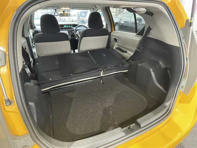 トヨタ アクア S 愛知県 2012(平24)年 4.8万km イエロー 純正メモリナビ〈NSCP-W62〉/・CD／Bluetooth／地デジTV/オートエアコン/前後ドライブレコーダー〈Y5〉/ETC/電動格納ミラー/純正フロアマット/リモコンキー