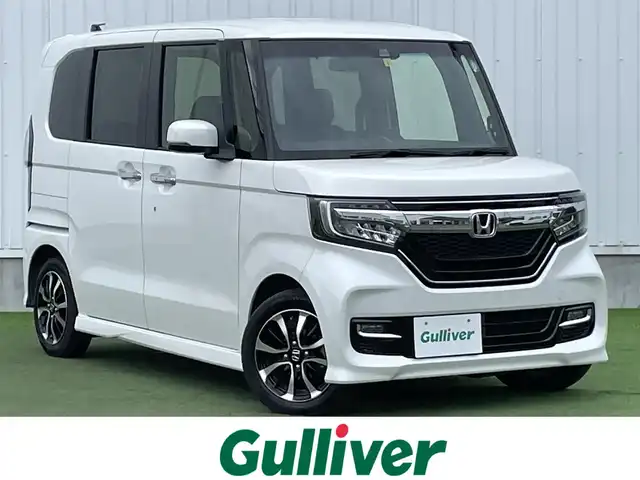 ホンダ Ｎ ＢＯＸ カスタム G L ホンダセンシング 香川県 2020(令2)年 3.2万km プラチナホワイトパール 登録時走行距離：31501km/ディーラー純正ナビ/　CD DVD BT　フルセグTV/バックカメラ/左側パワースライドドア/衝突被害軽減/レーンキープアシスト/レーダークルーズコントロール/LEDヘッドライト/オートライト/フォグランプ/横滑り防止装置/ビルトインETC/ベンチシート/シートヒーター/ロールサンシェード/ISOFIX/プッシュスタート/スマートキー/スペアキー