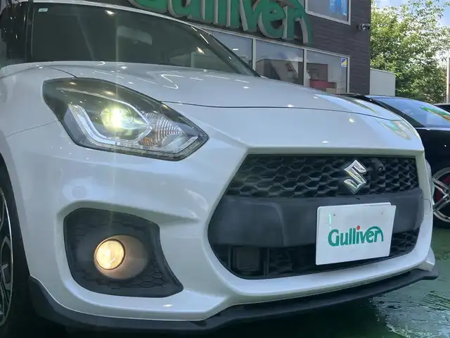スズキ スイフト スポーツ セーフティPKG 神奈川県 2019(令1)年 2.1万km ピュアホワイトP アダクティブクルーズコントロール/全方位カメラ/純正OPナビ/フルセグTV/バックカメラ/Bluetooth接続可/DVD再生可/レーダークルコン/純正17インチAW/D席シートヒーター/ビルトインETC/LEDヘッドライト/AUTOライト/スマートキー×2
