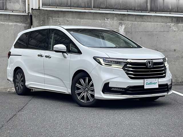 ホンダ オデッセイ ハイブリッド e:HEVアブソルート 愛知県 2021(令3)年 3.9万km プラチナホワイトパール ワンオーナー/ジェスチャーコントロールパワースライドドア/純正Gathersナビ/フルセグTV・AppleCarPlay・Bluetooth・ipod/・DVD・CD・FM・AM・USB・HDMI/ビルトインETC2.0/2列目プレミアムクレードルシート/2列目オットマンシート/マルチビューモニター/クリアランスソナー/前席パワーシート/オートブレークホールド/路外逸脱抑制システム/プリクラッシュセーフティ/レーダークルーズコントロール/ステアリングスイッチ/LEDヘッドライト/フォグランプ/純正フロアマット/保証書/取扱説明書/スペアスマートキー