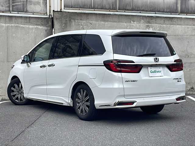 ホンダ オデッセイ ハイブリッド e:HEVアブソルート 愛知県 2021(令3)年 3.9万km プラチナホワイトパール ワンオーナー/ジェスチャーコントロールパワースライドドア/純正Gathersナビ/フルセグTV・AppleCarPlay・Bluetooth・ipod/・DVD・CD・FM・AM・USB・HDMI/ビルトインETC2.0/2列目プレミアムクレードルシート/2列目オットマンシート/マルチビューモニター/クリアランスソナー/前席パワーシート/オートブレークホールド/路外逸脱抑制システム/プリクラッシュセーフティ/レーダークルーズコントロール/ステアリングスイッチ/LEDヘッドライト/フォグランプ/純正フロアマット/保証書/取扱説明書/スペアスマートキー