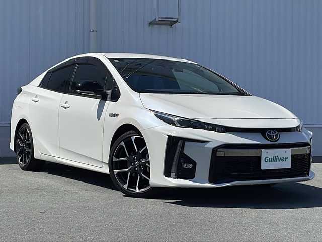 トヨタ プリウス ＰＨＶ S GRスポーツ 三重県 2019(令1)年 6.2万km ホワイトパールクリスタルシャイン ALPINE9型ナビ(AM/FM/CD/DVD/TV/BT)/フルセグTV/バックカメラ/ALPINE前方ドライブレコーダー/ビルトインETC/ハーフレザーシート/前席シートヒーター/革巻きステアリング/純正充電ケーブル付/レーダークルーズコントロール/レーンキープアシスト/衝突軽減ブレーキ/横滑り防止/オートハイビーム/スペアキー/純正フロアマット/LEDヘッドライト/電動格納ミラー/禁煙車