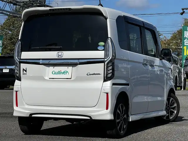 ホンダ Ｎ ＢＯＸ カスタム G L ホンダセンシング 道央・札幌 2019(令1)年 6.7万km プラチナホワイトパール ４WD/社外SDナビ/AM/FM/BT/SD/CD/フルセグ/ホンダセンシング/衝突被害軽減ブレーキ/横滑り防止装置/アダプティブクルーズコントロール/レーンキープアシスト/コーナーセンサー/バックカメラ/ビルトインETC/アイドリングストップ/ECOMODE/両側パワースライドドア/前席シートヒーター/ステアリングリモコン/プッシュスタート/スマートキー/LEDヘッドライト/オートライト/オートマチックハイビーム/フォグランプ/電動格納ミラー/ヒーテッドドアミラー/ウィンカーミラー/純正フロアマット/ドアバイザー/純正エンジンスターター