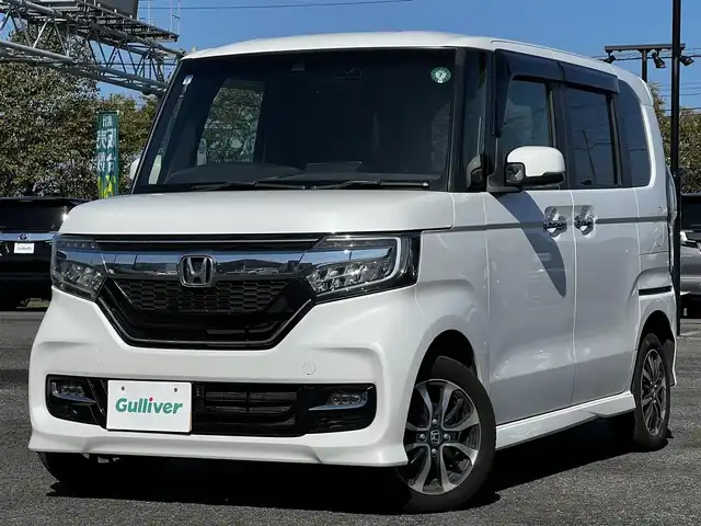 ホンダ Ｎ ＢＯＸ カスタム G L ホンダセンシング 道央・札幌 2019(令1)年 6.7万km プラチナホワイトパール ４WD/社外SDナビ/AM/FM/BT/SD/CD/フルセグ/ホンダセンシング/衝突被害軽減ブレーキ/横滑り防止装置/アダプティブクルーズコントロール/レーンキープアシスト/コーナーセンサー/バックカメラ/ビルトインETC/アイドリングストップ/ECOMODE/両側パワースライドドア/前席シートヒーター/ステアリングリモコン/プッシュスタート/スマートキー/LEDヘッドライト/オートライト/オートマチックハイビーム/フォグランプ/電動格納ミラー/ヒーテッドドアミラー/ウィンカーミラー/純正フロアマット/ドアバイザー/純正エンジンスターター