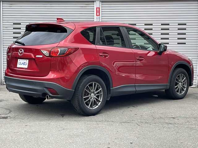 マツダ ＣＸ－５ XD Lパッケージ 道央・札幌 2013(平25)年 7.4万km ソウルレッドプレミアムメタリック (株)IDOMが運営する【じしゃロン札幌豊平店】の自社ローン専用車両になります。こちらは現金またはオートローンご利用価格です。自社ローンご希望の方は別途その旨お申し付けください。/社外ナビ/Bluetooth/ワンセグテレビ/バックカメラ/ETC/プッシュスタート/クルーズコントロール/パワーシート/シートヒーター/キセノンライト/オートライト/レーンキープアシスト/電動格納ミラー/スマートキー/アイドリングストップ