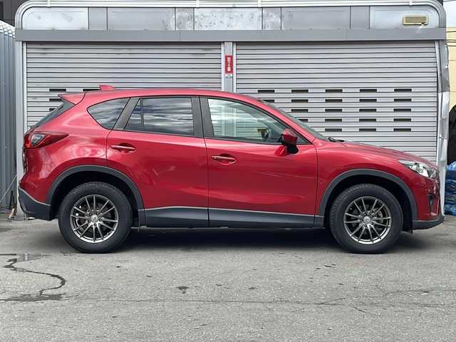 マツダ ＣＸ－５ XD Lパッケージ 道央・札幌 2013(平25)年 7.4万km ソウルレッドプレミアムメタリック (株)IDOMが運営する【じしゃロン札幌豊平店】の自社ローン専用車両になります。こちらは現金またはオートローンご利用価格です。自社ローンご希望の方は別途その旨お申し付けください。/社外ナビ/Bluetooth/ワンセグテレビ/バックカメラ/ETC/プッシュスタート/クルーズコントロール/パワーシート/シートヒーター/キセノンライト/オートライト/レーンキープアシスト/電動格納ミラー/スマートキー/アイドリングストップ