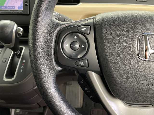 ホンダ フリード G ホンダセンシング 鹿児島県 2017(平29)年 4.9万km ブルーホライゾンM ホンダセンシング/純正ナビ/Bluetooth/CD/DVDプレイヤー/フルセグTV/バックカメラ/追従式クルーズコントロール/スマートキー/　（スペア１）/プッシュスタート/両側パワースライドドア/アイドリングストップ/レーンキープアシスト/新車保証書/取扱説明書