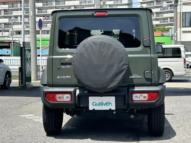 スズキ ジムニー シエラ JC 愛知県 2018(平30)年 0.6万km ジャングルグリーン ワンオーナー/社外SDナビテレビ/フルセグテレビ/プッシュエンジンスタート/ETC/4WD/レーダークルーズコントロール/衝突軽減装置/横滑り防止装置/シートヒーター/純15インチAW/新車保証書.取説/スペアキー