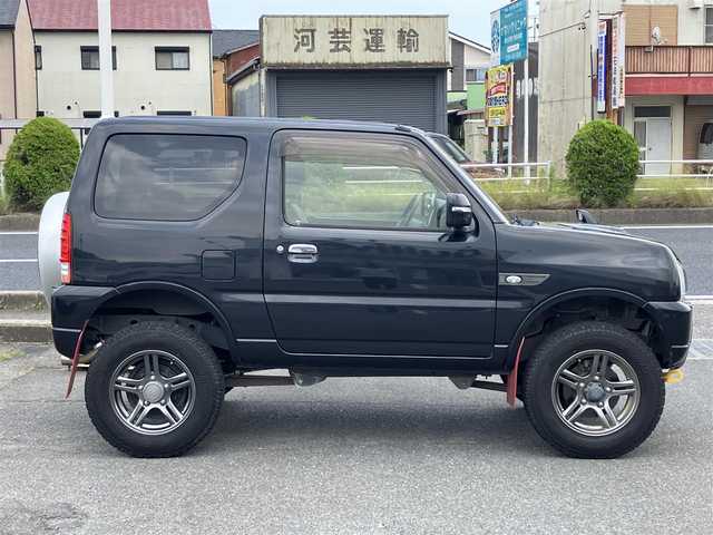 スズキ ジムニー ランドベンチャー 三重県 2015(平27)年 6万km ブルーイッシュブラックパール3 ♪走行60049km/♪4WD/ターボ/リフトアップ/社外マフラー(MRS)/社外テールレンズ/MRSターボインテークチャンバー/牽引フック(フロント/リア)/ハーフレザー/前席シートヒーター/社外ナビ/・DVD再生・USB/・フルセグ・SD/・Bluetoothオーディオ/LEDヘッドライト/LEDフォグライト/純正15インチAW/背面タイヤ/ウィンカーミラー /前後ドライブレコーダー/ステアリングスイッチ/ヘッドライトレベライザー/革巻シフトノブ/フロアマット/ドアバイザー/電格ミラー/ETC2.0