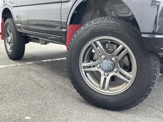 スズキ ジムニー ランドベンチャー 三重県 2015(平27)年 6万km ブルーイッシュブラックパール3 ♪走行60049km/♪4WD/ターボ/リフトアップ/社外マフラー(MRS)/社外テールレンズ/MRSターボインテークチャンバー/牽引フック(フロント/リア)/ハーフレザー/前席シートヒーター/社外ナビ/・DVD再生・USB/・フルセグ・SD/・Bluetoothオーディオ/LEDヘッドライト/LEDフォグライト/純正15インチAW/背面タイヤ/ウィンカーミラー /前後ドライブレコーダー/ステアリングスイッチ/ヘッドライトレベライザー/革巻シフトノブ/フロアマット/ドアバイザー/電格ミラー/ETC2.0