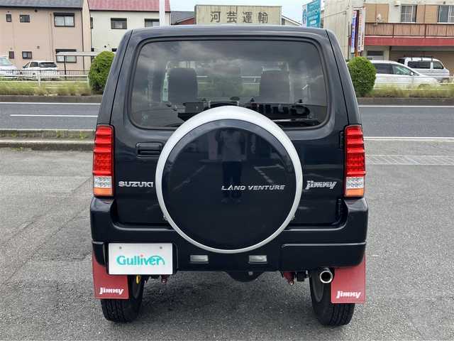 スズキ ジムニー ランドベンチャー 三重県 2015(平27)年 6万km ブルーイッシュブラックパール3 ♪走行60049km/♪4WD/ターボ/リフトアップ/社外マフラー(MRS)/社外テールレンズ/MRSターボインテークチャンバー/牽引フック(フロント/リア)/ハーフレザー/前席シートヒーター/社外ナビ/・DVD再生・USB/・フルセグ・SD/・Bluetoothオーディオ/LEDヘッドライト/LEDフォグライト/純正15インチAW/背面タイヤ/ウィンカーミラー /前後ドライブレコーダー/ステアリングスイッチ/ヘッドライトレベライザー/革巻シフトノブ/フロアマット/ドアバイザー/電格ミラー/ETC2.0