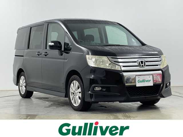 ホンダ ステップワゴン スパーダ S 道央・札幌 2009(平21)年 10.1万km プレミアムブラキッシュパール ・4WD/・純正ナビ  フルセグ/CD/DVD/HDD/・バックカメラ/・両側パワースライドドア/・前後ドライブレコーダー/・社外エンジンスターター/・ETC/オートライト/・純正フロアマット/・ABS