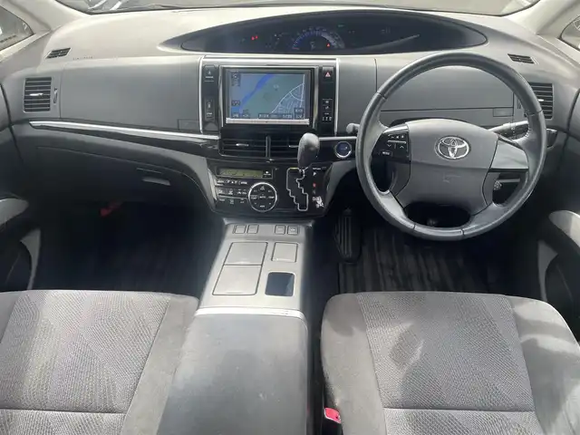 トヨタ エスティマ ハイブリッド アエラス 道央・札幌 2013(平25)年 7.1万km ホワイトパールクリスタルシャイン ワンオーナー/４WD/純正メモリナビ、地デジ、Bluetooth、CD、DVD/　（NHZN-X62G）/バックカメラ/クルーズコントロール/革巻きステア/ビルトインETC/HIDヘッドライト/ウインカーミラー/純正ドライブレコーダー（前方録画）/スマートキー×２/両側パワースライドドア/運転席パワーシート/コーナーセンサー（前後）/保証書、取説