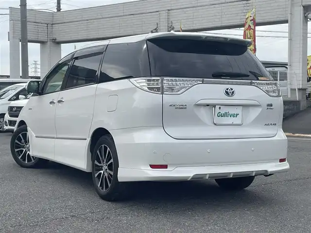 トヨタ エスティマ ハイブリッド アエラス 道央・札幌 2013(平25)年 7.1万km ホワイトパールクリスタルシャイン ワンオーナー/４WD/純正メモリナビ、地デジ、Bluetooth、CD、DVD/　（NHZN-X62G）/バックカメラ/クルーズコントロール/革巻きステア/ビルトインETC/HIDヘッドライト/ウインカーミラー/純正ドライブレコーダー（前方録画）/スマートキー×２/両側パワースライドドア/運転席パワーシート/コーナーセンサー（前後）/保証書、取説