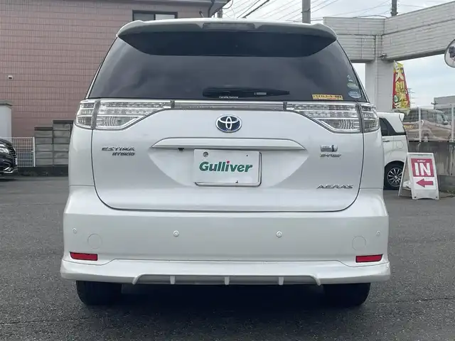 トヨタ エスティマ ハイブリッド アエラス 道央・札幌 2013(平25)年 7.1万km ホワイトパールクリスタルシャイン ワンオーナー/４WD/純正メモリナビ、地デジ、Bluetooth、CD、DVD/　（NHZN-X62G）/バックカメラ/クルーズコントロール/革巻きステア/ビルトインETC/HIDヘッドライト/ウインカーミラー/純正ドライブレコーダー（前方録画）/スマートキー×２/両側パワースライドドア/運転席パワーシート/コーナーセンサー（前後）/保証書、取説