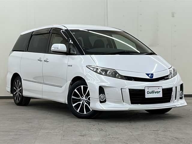 トヨタ エスティマ ハイブリッド アエラス 道央・札幌 2013(平25)年 7.1万km ホワイトパールクリスタルシャイン /ワンオーナー//４WD//純正メモリナビ//バックカメラ//クルーズコントロール//ETC//HIDヘッドライト//ウインカーミラー//純正ドライブレコーダー（前方録画）//スマートキー×２//両側パワースライドドア//運転席パワーシート//コーナーセンサー