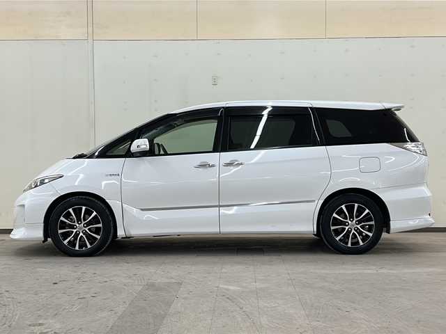 トヨタ エスティマ ハイブリッド アエラス 道央・札幌 2013(平25)年 7.1万km ホワイトパールクリスタルシャイン /ワンオーナー//４WD//純正メモリナビ//バックカメラ//クルーズコントロール//ETC//HIDヘッドライト//ウインカーミラー//純正ドライブレコーダー（前方録画）//スマートキー×２//両側パワースライドドア//運転席パワーシート//コーナーセンサー