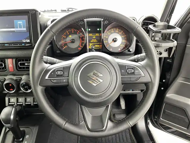 スズキ ジムニー シエラ JC 福井県 2024(令6)年 0.8万km ブルーイッシュブラックパール3 ＫＥＮＷＯＯＤ製８型ナビ/純正１５インチアルミホイール/社外ＥＴＣ/純正ＬＥＤヘッドライト/純正フロントフォグライト/シートヒーター/クルーズコントロール/ダウンヒルアシスト/センターデフロック