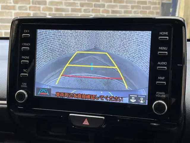 トヨタ ヤリス ハイブリッド G 岩手県 2023(令5)年 1.8万km ブラック/アバンギャルドブロンズメタリック ４WD/寒冷地仕様/ウインドシールドデアイサー/PTCヒーター/リヤヒーターダクト/トヨタセーフティセンス/プリクラッシュセーフティ/レーダークルーズコントロール/レーントレーシングアシスト/ロードサインアシスト/オートマチックハイビーム/先行車発進告知機能/横滑り防止装置/純正ディスプレイオーディオ/ナビキット/AppleCarPlay・AndroidAuto/バックカメラ/ETC/ステアリングスイッチ/ヘッドライトレベライザー/フォグランプ/純正１５インチアルミホイール