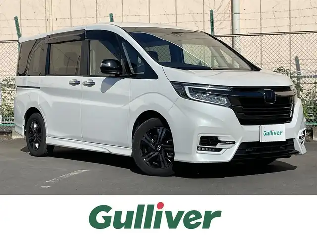 ホンダ ステップワゴン 東京都 2022(令4)年 1.9万km プラチナホワイトパール 純正ナビ　/フルセグ　/ＣＤ　/ＤＶＤ　/Ｂｌｕｅｔｏｏｔｈ　/バックカメラ　/ドラレコ　/両側電動スライドドア　/追従型クルコン　　/シートヒーター　/ドアバイザー　/ＥＴＣ２．０　/純正フロアマット　/衝突被害軽減システム/横滑り防止装置/レーンアシスト