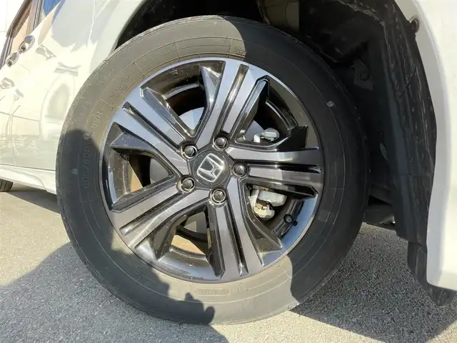 ホンダ ステップワゴン 東京都 2022(令4)年 1.9万km プラチナホワイトパール 純正ナビ　/フルセグ　/ＣＤ　/ＤＶＤ　/Ｂｌｕｅｔｏｏｔｈ　/バックカメラ　/ドラレコ　/両側電動スライドドア　/追従型クルコン　　/シートヒーター　/ドアバイザー　/ＥＴＣ２．０　/純正フロアマット　/衝突被害軽減システム/横滑り防止装置/レーンアシスト