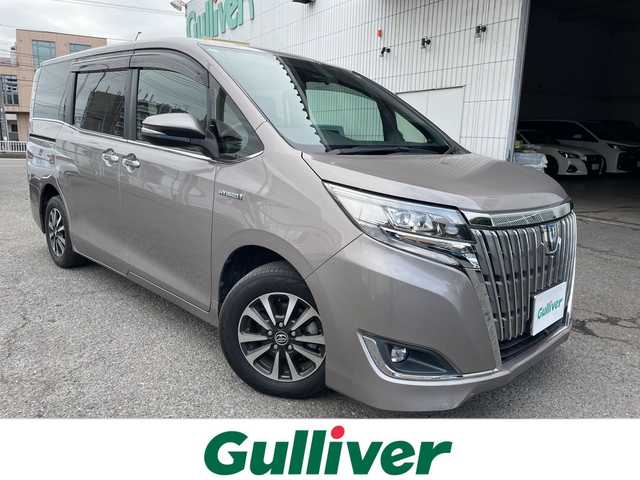 トヨタ エスクァイア ハイブリッド Gi プレミアムパッケージ 神奈川県 2018(平30)年 6.8万km アバンギャルドブロンズメタリック 純正ナビ/AM/FM/DVD/CD/Bluetooth接続/HDMI接続/USB接続/フルセグTV/純正フリップダウンモニター/クルーズコントロール/両側パワースライドドア/前席シートヒーター/ビルトインETC/前方ドライブレコーダー/フロント＋バックカメラ/トヨタセーフティーセンス/LEDライト/オートライト