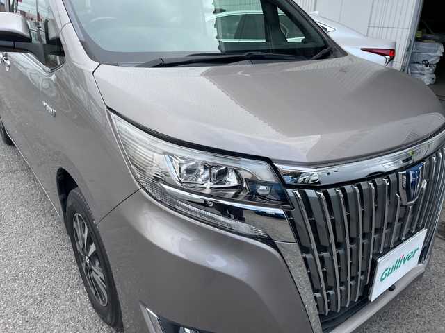 トヨタ エスクァイア ハイブリッド Gi プレミアムパッケージ 神奈川県 2018(平30)年 6.8万km アバンギャルドブロンズメタリック 純正ナビ/AM/FM/DVD/CD/Bluetooth接続/HDMI接続/USB接続/フルセグTV/純正フリップダウンモニター/クルーズコントロール/両側パワースライドドア/前席シートヒーター/ビルトインETC/前方ドライブレコーダー/フロント＋バックカメラ/トヨタセーフティーセンス/LEDライト/オートライト