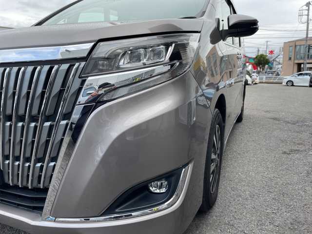 トヨタ エスクァイア ハイブリッド Gi プレミアムパッケージ 神奈川県 2018(平30)年 6.8万km アバンギャルドブロンズメタリック 純正ナビ/AM/FM/DVD/CD/Bluetooth接続/HDMI接続/USB接続/フルセグTV/純正フリップダウンモニター/クルーズコントロール/両側パワースライドドア/前席シートヒーター/ビルトインETC/前方ドライブレコーダー/フロント＋バックカメラ/トヨタセーフティーセンス/LEDライト/オートライト