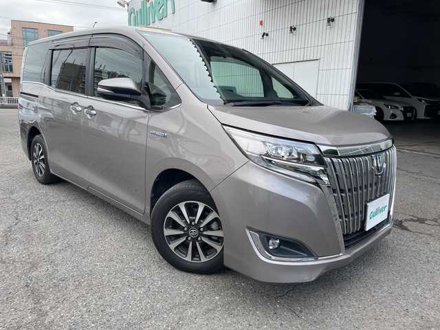 トヨタ エスクァイア ハイブリッド Gi プレミアムパッケージ 神奈川県 2018(平30)年 6.8万km アバンギャルドブロンズメタリック 純正ナビ/AM/FM/DVD/CD/Bluetooth接続/HDMI接続/USB接続/フルセグTV/純正フリップダウンモニター/クルーズコントロール/両側パワースライドドア/前席シートヒーター/ビルトインETC/前方ドライブレコーダー/フロント＋バックカメラ/トヨタセーフティーセンス/LEDライト/オートライト