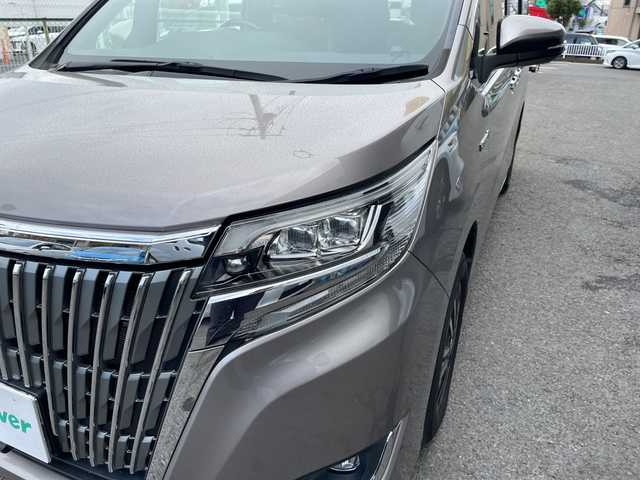 トヨタ エスクァイア ハイブリッド Gi プレミアムパッケージ 神奈川県 2018(平30)年 6.8万km アバンギャルドブロンズメタリック 純正ナビ/AM/FM/DVD/CD/Bluetooth接続/HDMI接続/USB接続/フルセグTV/純正フリップダウンモニター/クルーズコントロール/両側パワースライドドア/前席シートヒーター/ビルトインETC/前方ドライブレコーダー/フロント＋バックカメラ/トヨタセーフティーセンス/LEDライト/オートライト