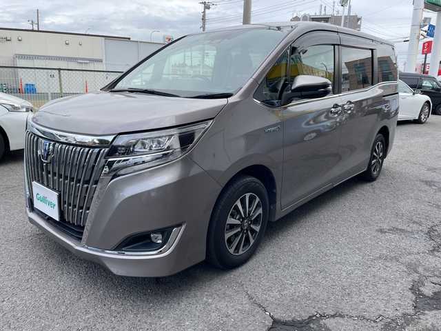 トヨタ エスクァイア ハイブリッド Gi プレミアムパッケージ 神奈川県 2018(平30)年 6.8万km アバンギャルドブロンズメタリック 純正ナビ/AM/FM/DVD/CD/Bluetooth接続/HDMI接続/USB接続/フルセグTV/純正フリップダウンモニター/クルーズコントロール/両側パワースライドドア/前席シートヒーター/ビルトインETC/前方ドライブレコーダー/フロント＋バックカメラ/トヨタセーフティーセンス/LEDライト/オートライト